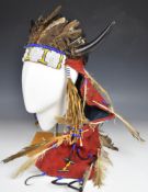 Native American headdress with hide lining, horns, bead work and feathers to front