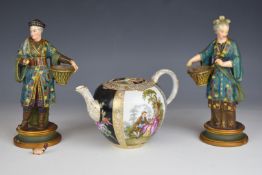 Pair of Meissen porcelain Oriental figures and a Meissen teapot decorated with Watteau scenes