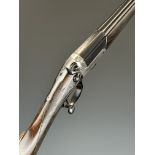John Rigby & Co 12 bore hammer action shotgun with named and engraved lock, engraved hammer,