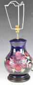 Moorcroft pedestal table lamp decorated in the Anemone pattern, H36cm