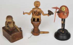 Three Japanese Kobe mechanical carved wood toys / dolls, tallest 15cm