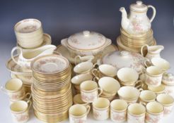 Royal Doulton dinner and tea ware in the Lisette pattern, approximately one hundred and thirty