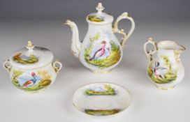 19thC porcelain tea pot, covered sucrier, cream jug and saucer decorated with exotic birds in the