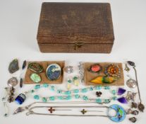 A collection of jewellery including vintage brooches, abalone pendant, three pairs of silver