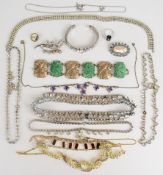 Four diamanté necklaces and a bangle, Jewelcraft necklace and earrings, Swarovski necklace and a