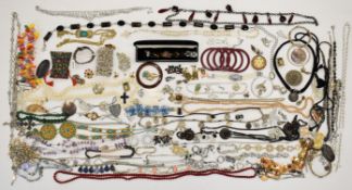 A collection of jewellery including diamanté necklaces and earrings, amethyst necklace, vintage