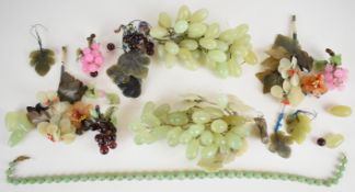 A collection of agate, hardstone and glass bouquets and bunches of grapes, and an aventurine