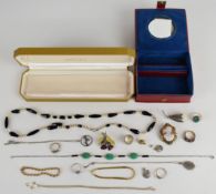 A collection of silver jewellery including four rings, three silver pendants and chains and a pair