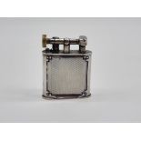 A silver and enamel lighter, Birmingham 1928, inscribed 'The Classic', 6.8cm high, (dents and losses