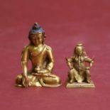 A Tibetan gilt-bronze Shakyamuni Buddha,