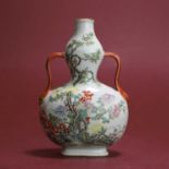 A Chinese porcelain famille rose double-gourd vase,