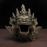 A Tibetan bronze incense burner,