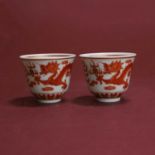 A pair of Chinese porcelain iron-red wine cups,