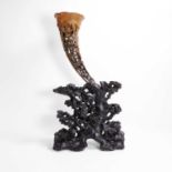 A Chinese rhinoceros horn libation cup,