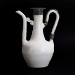 A Chinese white-glazed ewer,