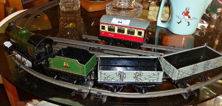 Hornby 0 gauge tinplate clockwork train set with engine, goods wagons, a carriage and track