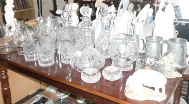 Good collection of cut crystal glassware including four decanters, two water jugs, carafes,