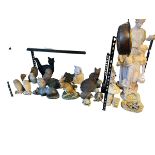 Two garden figures and collection of garden animals.