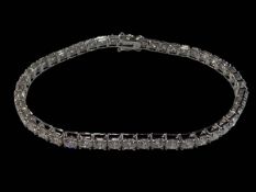 Good quality diamond tennis bracelet set in 18 carat white gold, diamond totalling over 8.60cts.