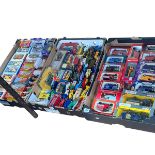 Three boxes of boxed and loose model vehicles including Corgi.