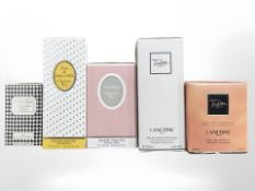 Five cellophane-sealed perfumes including Christian Dior.