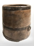 A 19th century metal bound wooden barrel shaped pot, height 18 cm.