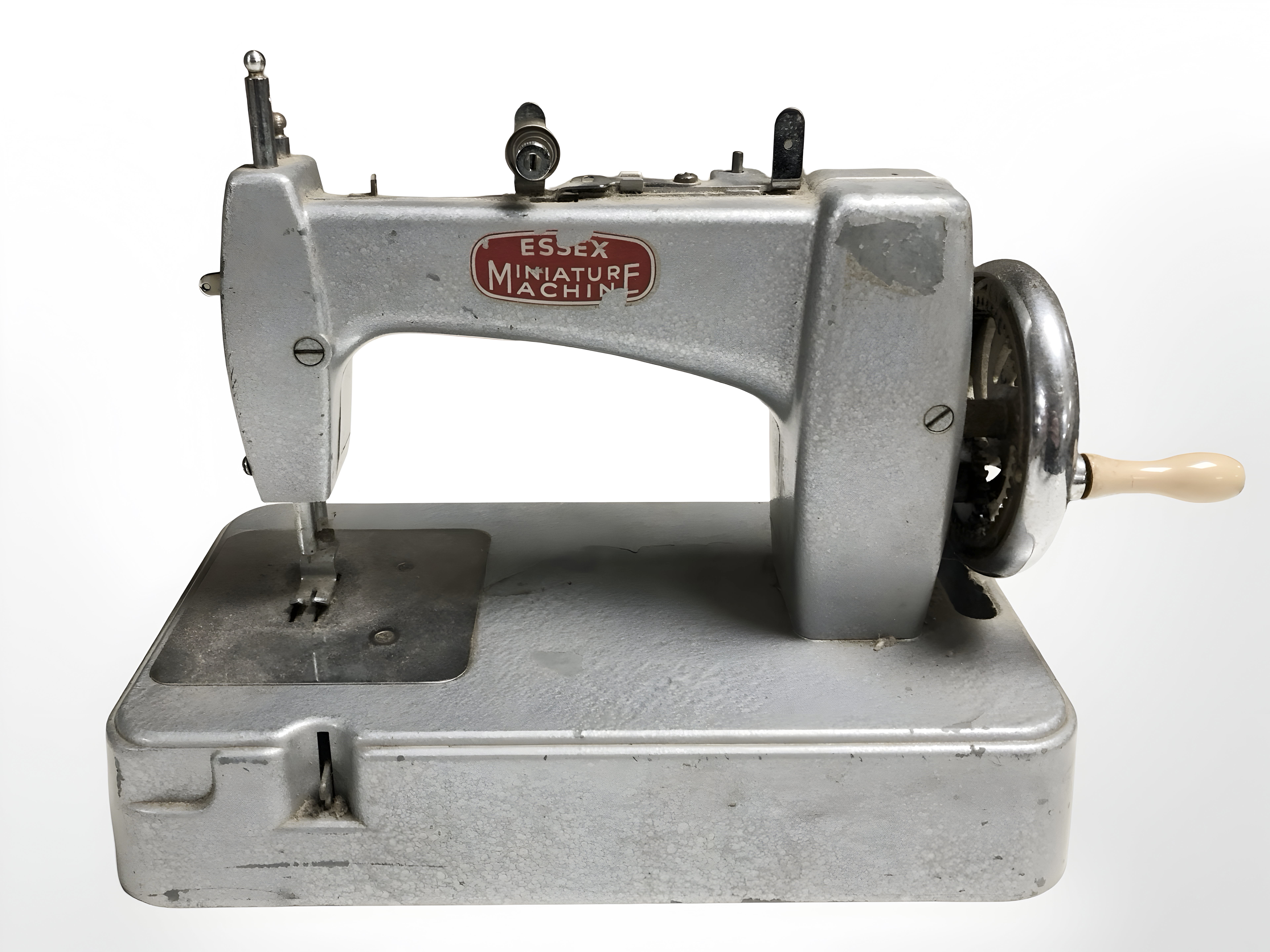 An Essex miniature sewing machine.