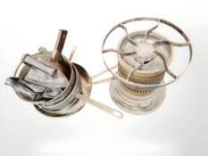 A copper cooking stove, various sauce pans, irons,