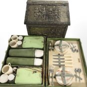 An embossed brass coal bin and a Brexton picnic set.