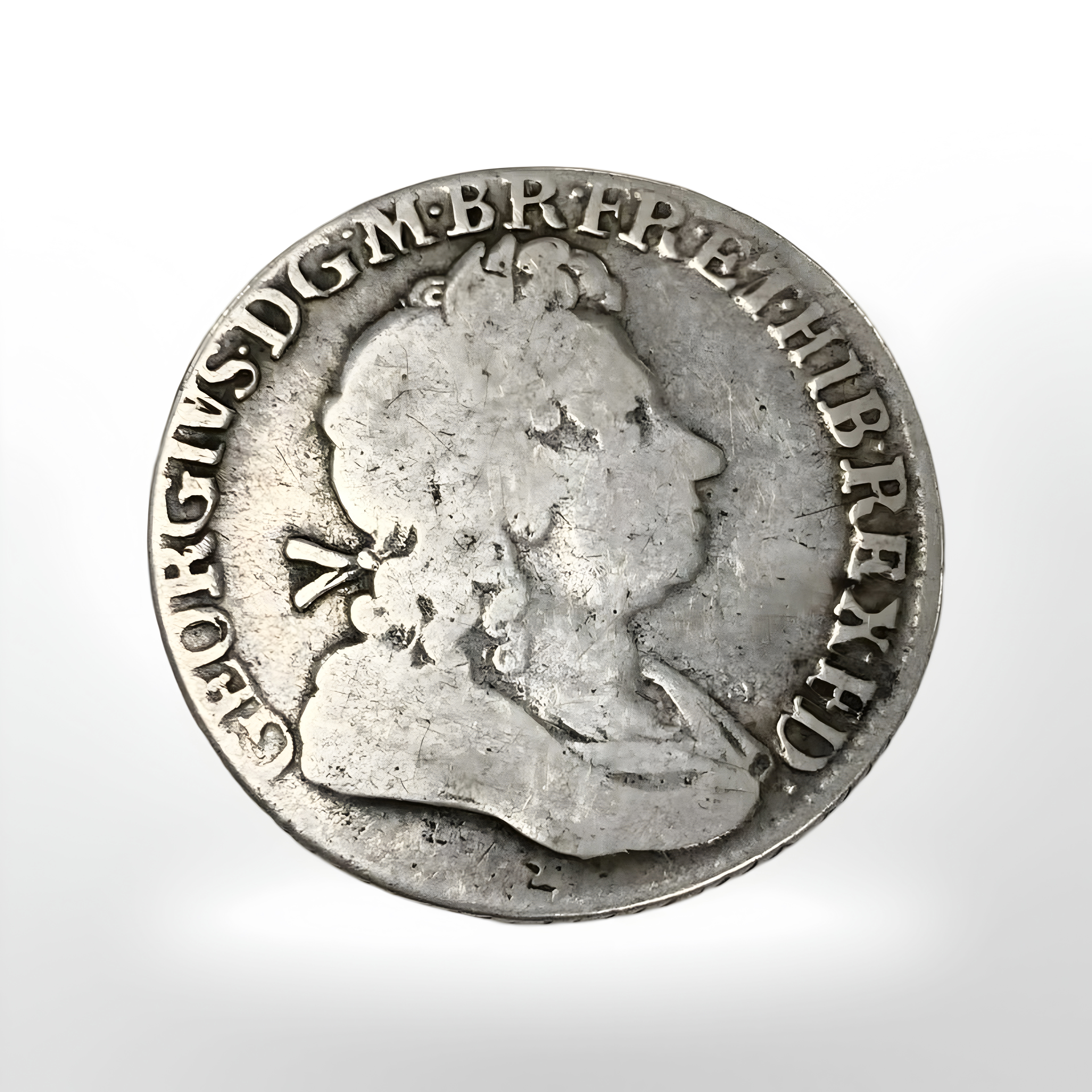 A George I silver shilling, 1723.