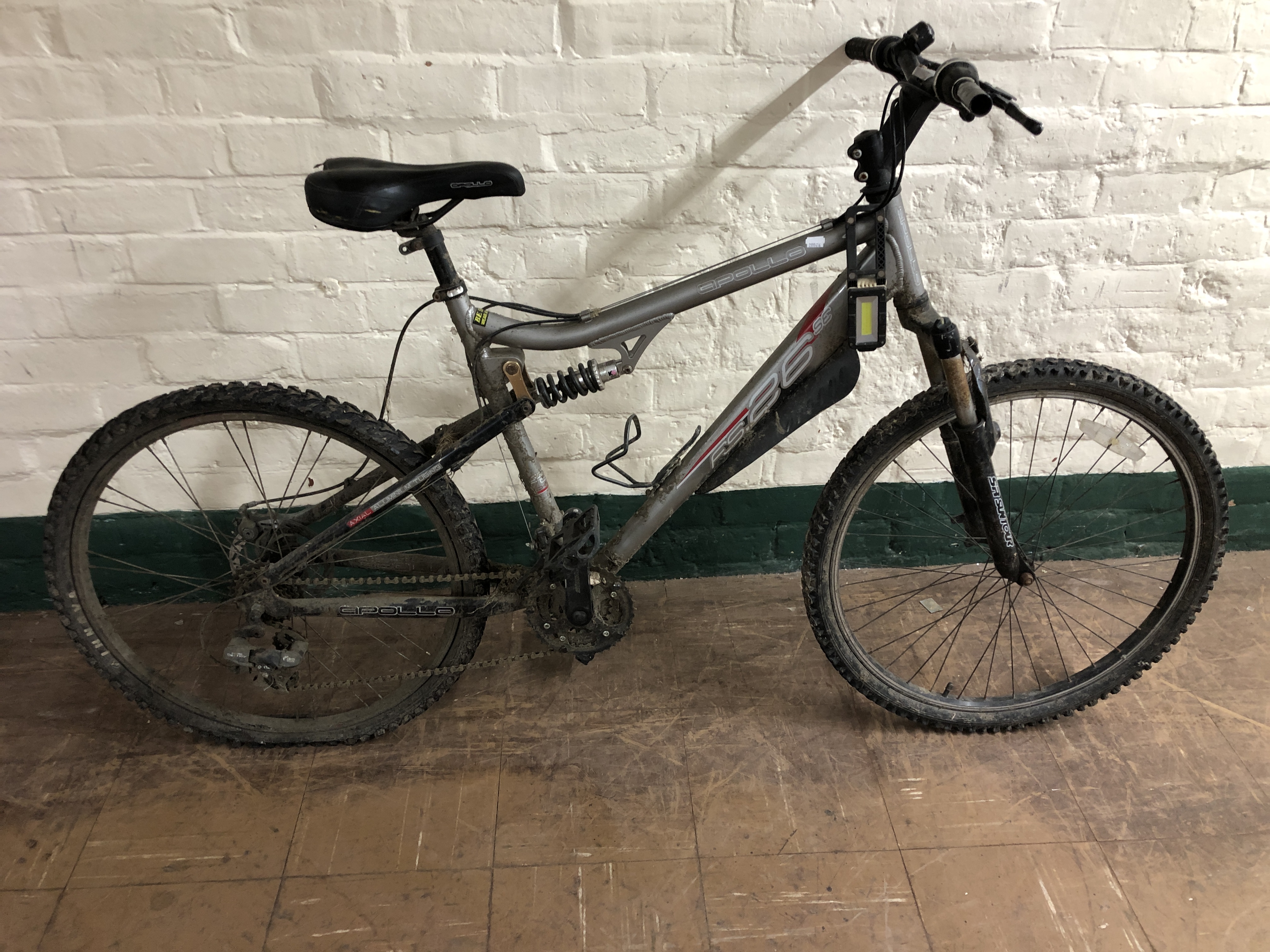 An Apollo FS 26 full suspension mountain bike