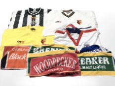 A group of pub bar cloths bearing advertising, Watford and Newcastle United football shirts, etc.