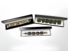 Three silver and enamelled bracelets.