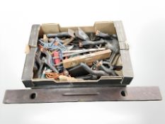 A group of wood working tools, vintage wooden spirit levels, hand drill, plastic clamps,