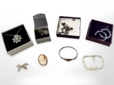 A group of jewellery including silver amber set bangle, filigree jewellery, cameo brooch,