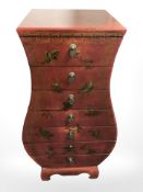 An Oriental lacquered seven drawer chest,