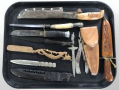A group of hunting and other knives, folding pliers,