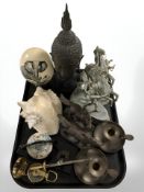 A group of ornaments including decorated ostrich egg, sea shell, two pairs of horse figures,