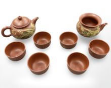 A miniature Japanese sake set.