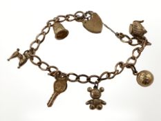 A 9ct gold padlock charm bracelet CONDITION REPORT: 12.
