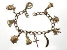 A 9ct gold charm bracelet CONDITION REPORT: 16g. No clasp.