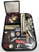 A long-stemmed pipe, assorted plated cutlery, cutthroat razor, pocket knife, compasses,