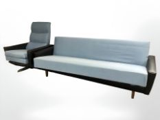 A 20th century Danish black vinyl and fabric three seater settee, length 206 cm,