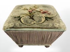 A 19th century upholstered storage stool,