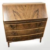 20th century walnut bow-front writing bureau,