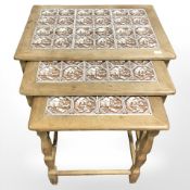 20th century Danish blond oak and inset tiled top nest of three tables,