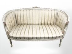 A continental and painted gilt framed salon settee,