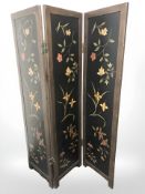 A reproduction three-fold screen with floral decoration,