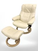 A Norwegian Ekornes Stressless bentwood and leather swivel lounge chair with matching footstool.