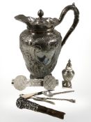 A silver souvenir spoon, a cut crystal knife rest with silver collars,